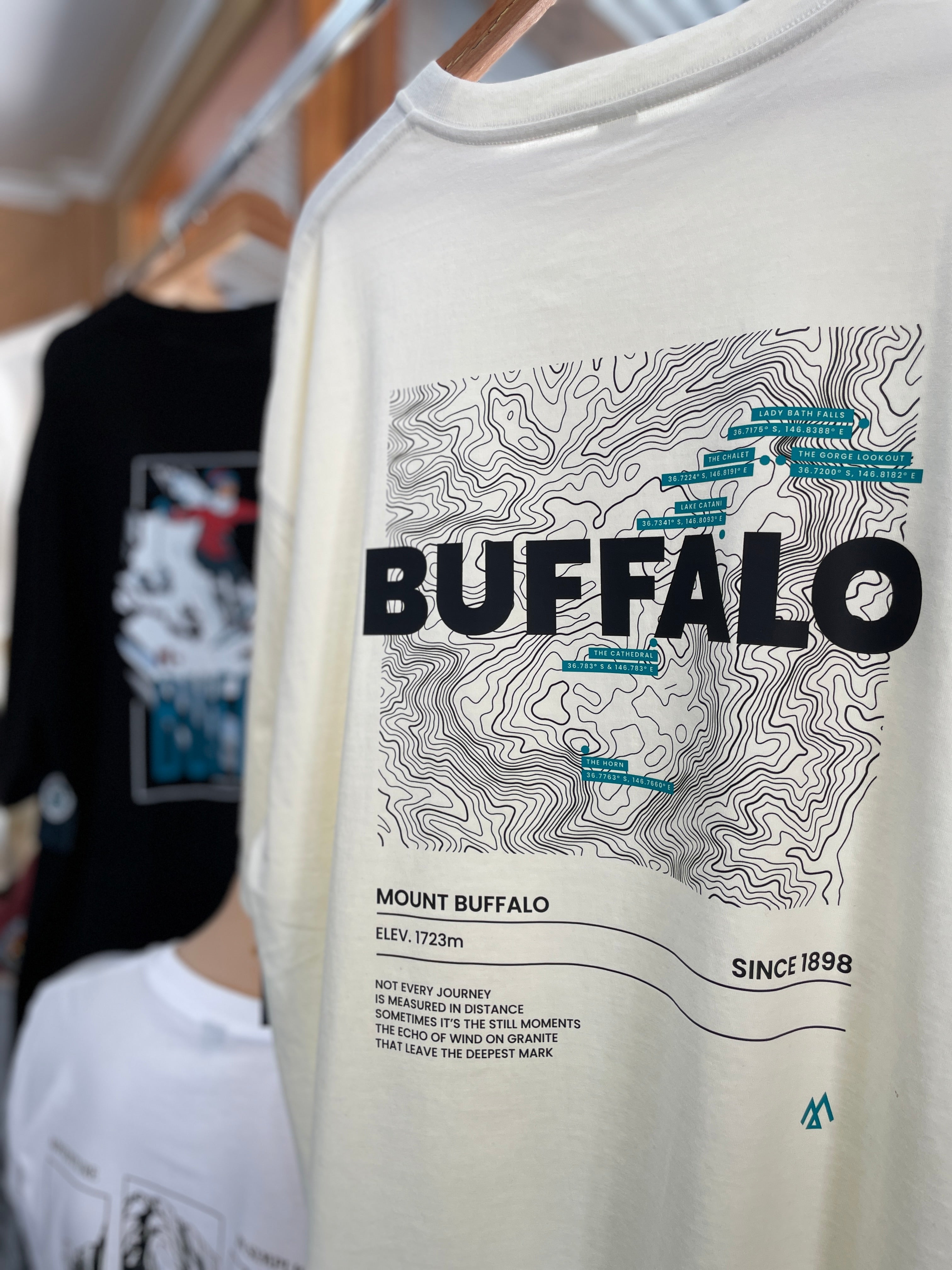 White t-shirt with 'Buffalo' graphic design on a hanger